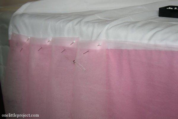 tulle being pinned to backing bedskirt