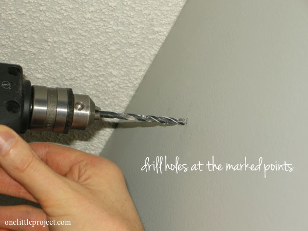 drilling holes into wall for curtain rod bracket