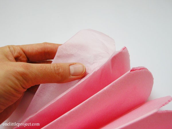 how to make tissue paper pom poms | onelittleproject.com