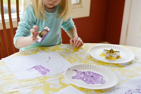 Easy cookie cutter painting craft for preschoolers | onelittleproject.com