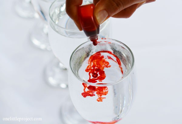 Adding food colouring to the water