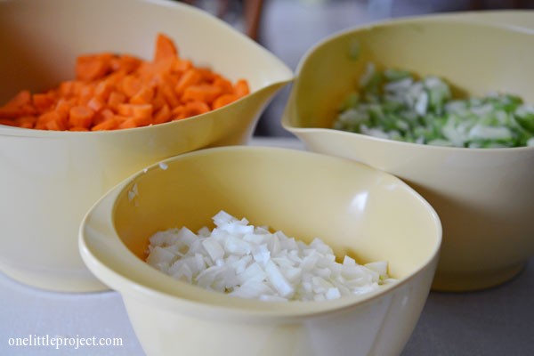 big bowls of carrots, onions and celery