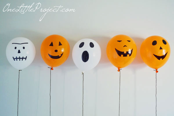 These permanent marker balloon pumpkins are super cheap and easy to put together.  And when you are done, there is nothing to store!