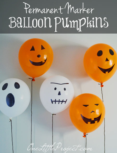 These permanent marker balloon pumpkins are super cheap and easy to put together.  And when you are done, there is nothing to store!