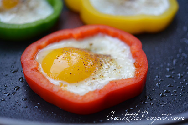 Why didn't I think of this sooner??  Cook eggs in bell pepper rings for an easy, healthy and beautiful breakfast!  Genius!