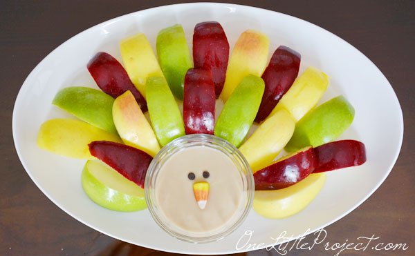 Set up apples around a bowl of dip and use candy corn as the beak and chocolate chips as the eyes.