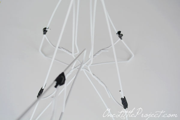 DIY Wire Hanger Christmas Tree Tutorial - So easy and resourceful to use wire hangers to make the tree forms!