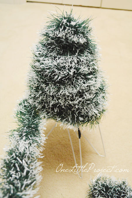 DIY Wire Hanger Christmas Tree Tutorial - So easy and resourceful to use wire hangers to make the tree forms!