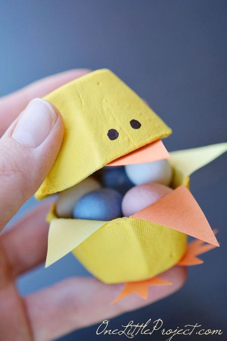 These fun little candy filled Easter egg carton chicks are a super cute Easter craft idea for kids.
