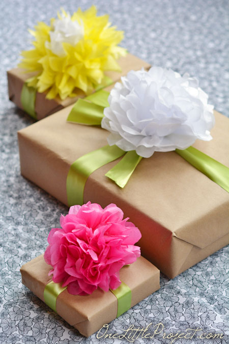 Gift wrapping with tissue paper flowers is a simple way to wrap gifts, but it looks so beautiful!  This would be perfect for Mother's Day!