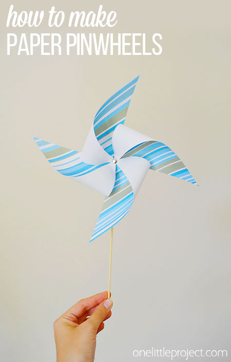 These paper pinwheels make beautiful party decorations!  They are easy to make, go together in minutes and are a fun addition to your summer decor!