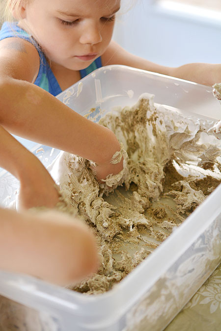 This shaving cream foam sand is an EASY way to make kinetic sand. It only takes two ingredients, and it ends up being a really interesting sensory experiment!