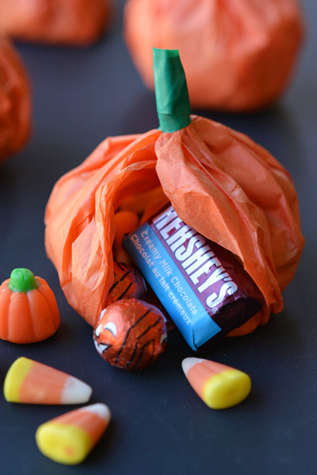These tissue paper pumpkin favours are a great treat to send to school on Halloween or they make super cute party favours! Use them for any fall occasion!