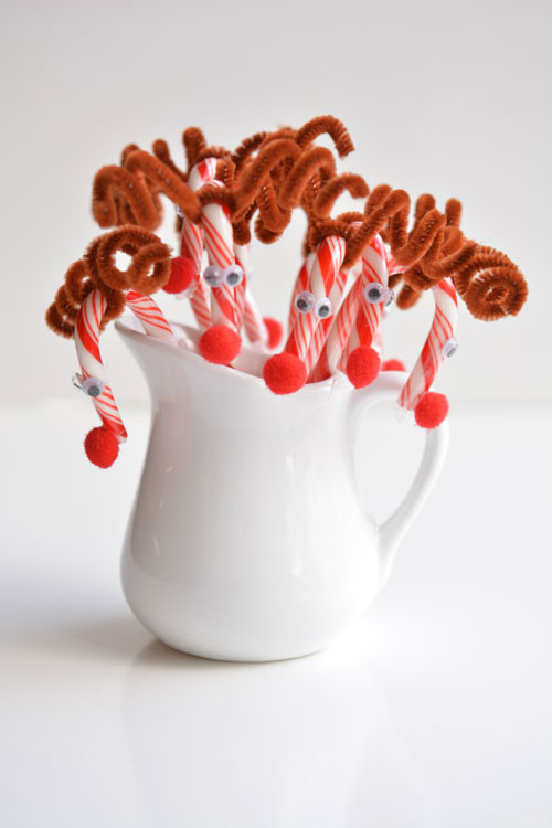 Do you remember making these Rudolph candy canes when you were a kid?! They're so cute and SO EASY! What a great holiday craft to do with the kids!