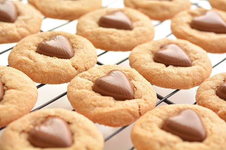 These chocolate heart peanut butter cookies are the EASIEST cookies ever! They only use 3 ingredients plus the chocolate hearts and they and taste amazing!!
