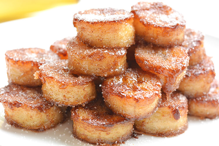 These pan fried cinnamon bananas are so easy to make and taste SO GOOD! They're amazing (seriously AMAZING) on ice cream or pancakes, or just as a snack. Soft and sweet on the inside and caramelized on the outside. Mmmm...