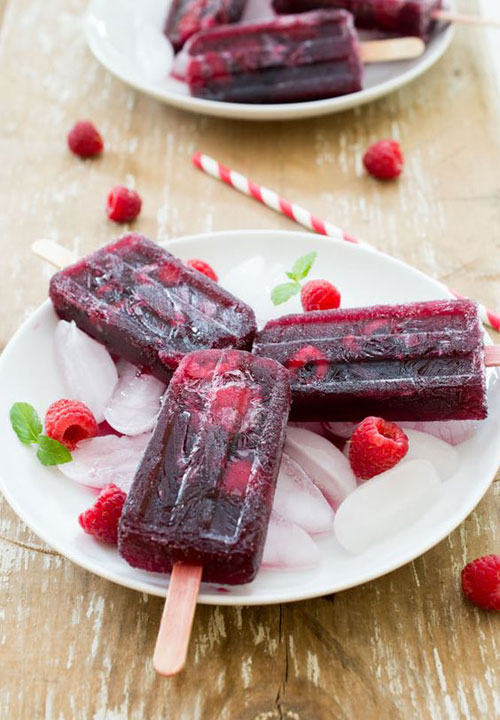 25 Best Homemade Popsicle Recipes - Four Ingredient Sangria Popsicles