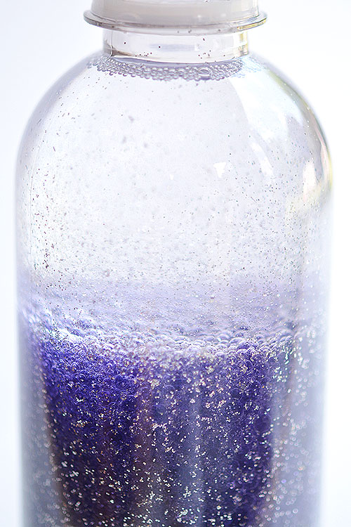 This anti-gravity galaxy in a bottle is such a FUN PROJECT to try with the kids! The glitter actually rises to the top, instead of settling to the bottom! So cool and so beautiful to watch!