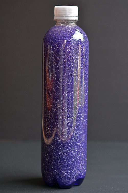This anti-gravity galaxy in a bottle is such a FUN PROJECT to try with the kids! The glitter actually rises to the top, instead of settling to the bottom! So cool and so beautiful to watch!