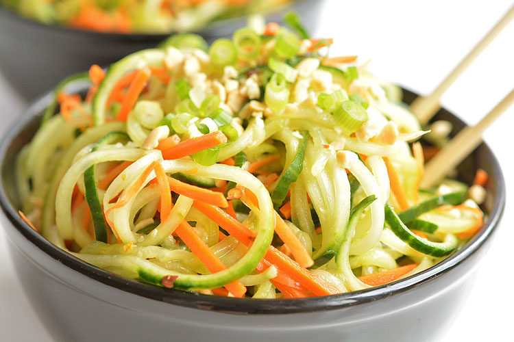 Spicy Thai cucumber salad with chopsticks in a bowl