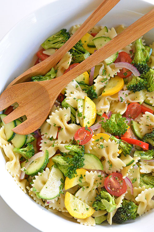 This garden vegetable pasta salad is SO GOOD! It's loaded with fresh ingredients in almost all the colours of the rainbow so you KNOW it's healthy! Such a great recipe for summer!