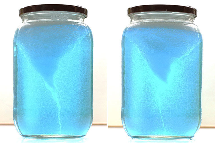 Two tornado in a jar experiments sitting beside each other