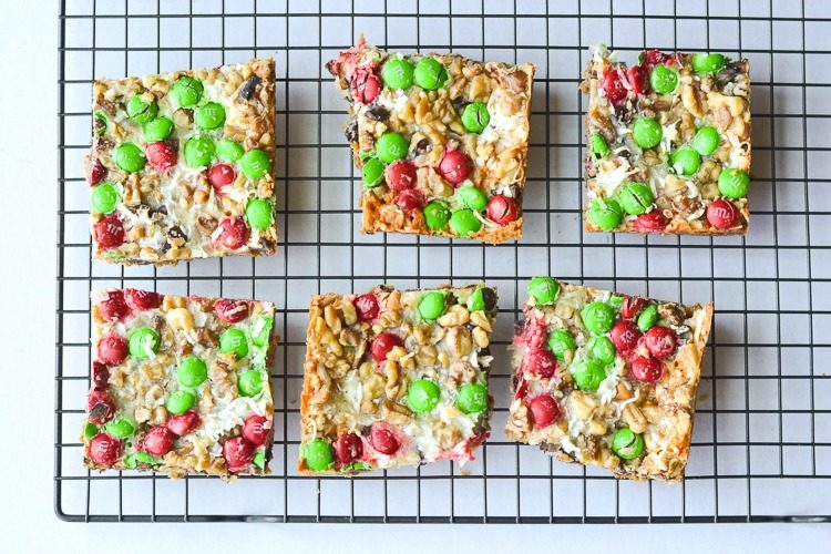 These Christmas magic cookie bars are a perfect treat to serve at a holiday party, just cut into bite size pieces and serve for a delicious holiday treat!