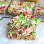 These Christmas magic cookie bars are a perfect treat to serve at a holiday party, just cut into bite size pieces and serve for a delicious holiday treat!