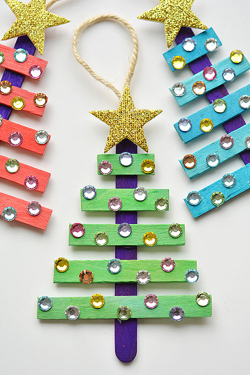 40+ Easy Christmas Crafts for Kids - Glittering Popsicle Stick Christmas Trees