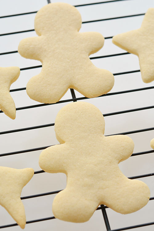 This recipe makes PERFECT sugar cookies! They're delicious both with and without icing, they keep their shape, have perfect edges every time and you don't need to chill the dough!
