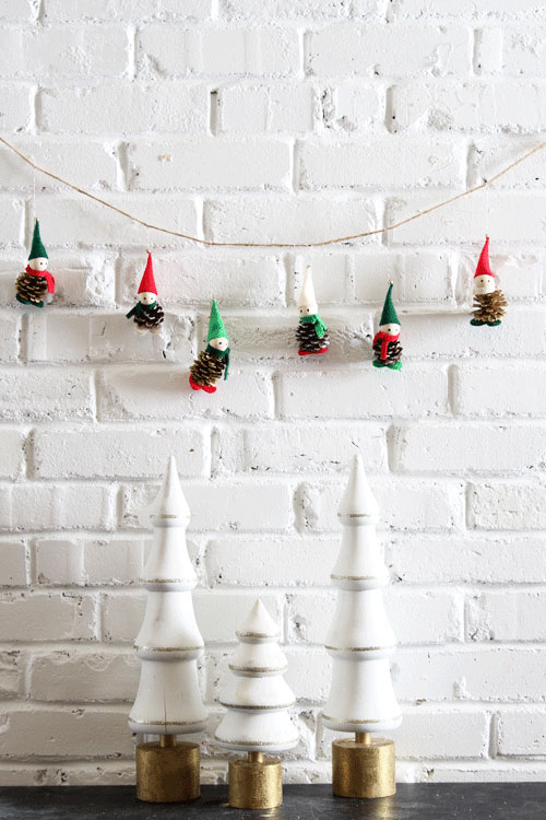 Make these adorable pinecone elves to hang on the tree or tie on a garland. Kids will love helping with this easy Christmas craft!