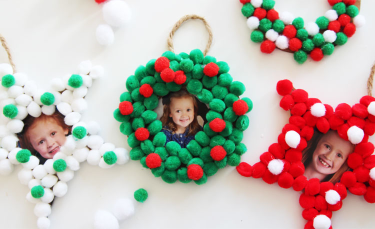 These pom pom Christmas photo ornaments are SO EASY for kids to make and would make the perfect addition to any tree this holiday!