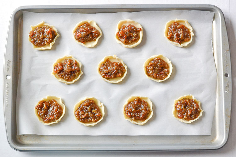 These pecan pie cookies are SO GOOD and come together quickly with just a few simple ingredients! All the deliciousness of pecan pie in a bite sized cookie!