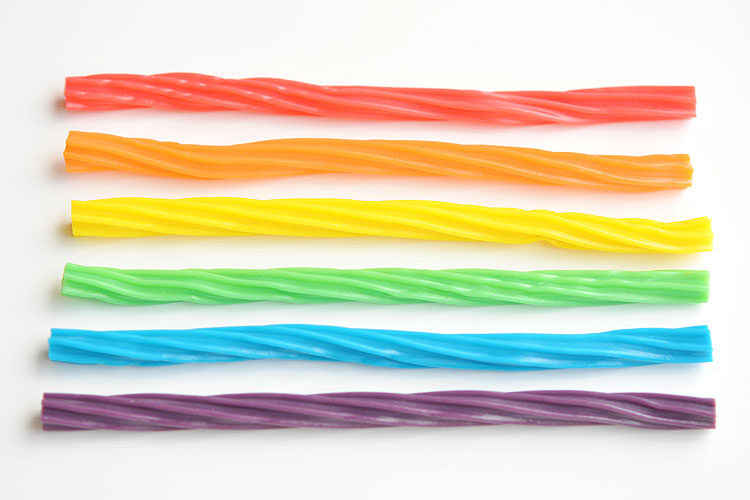 These rainbow licorice treat bags are SO SIMPLE and they look so cute! They're the perfect treat to make for St. Patrick's Day or even a rainbow birthday party! 