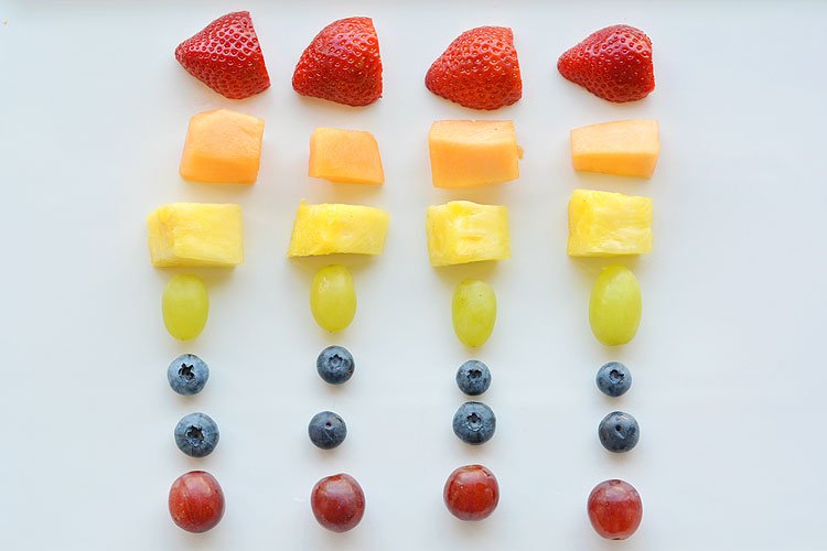 These rainbow Easter Peeps fruit kabobs are SO PRETTY! And they're so simple to make. Such a fun and healthy idea for a Easter snack and a great alternative to candy!