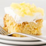 This light and fluffy pineapple sunshine cake tastes just like springtime! It's so easy to make and the perfect spring dessert!