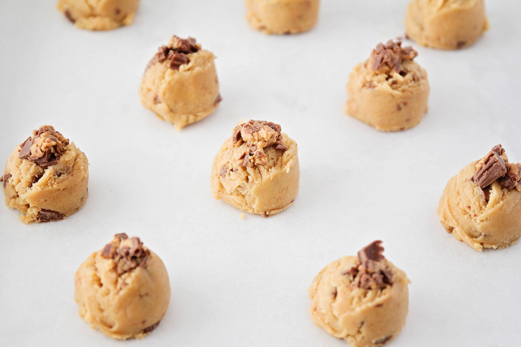 These Reese's peanut butter cookies are soft in the middle, crisp on the edges, and loaded with Reese's. The perfect treat for any peanut butter lover!