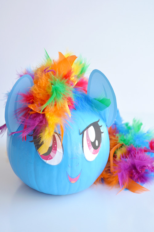 These no-carve My Little Pony pumpkins are SO EASY! Seriously, you paint the pumpkin, peel off the cute little printable faces and add a dollar store feather boa as the hair. So simple! (And best use of a feather boa, ever!) 
