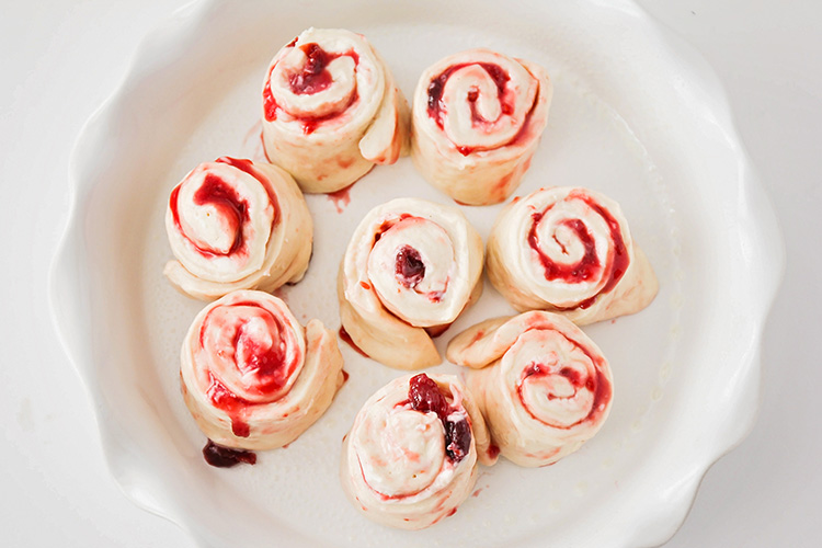 These raspberry cream cheese sweet rolls are ready in about 90 minutes, and so delicious! They're perfect for a tasty and sweet breakfast or dessert!