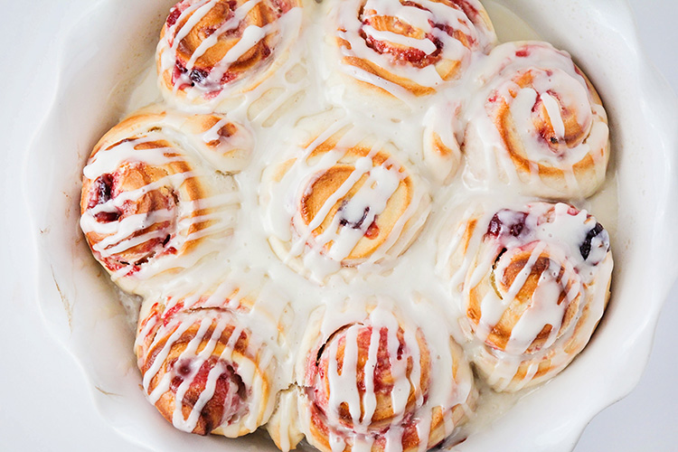 These raspberry cream cheese sweet rolls are ready in about 90 minutes, and so delicious! They're perfect for a tasty and sweet breakfast or dessert!