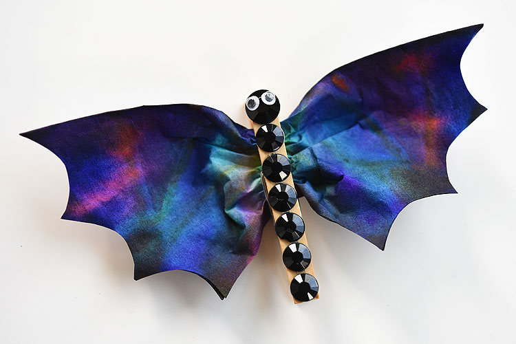 These coffee filter bats are such an easy Halloween craft to make with the kids! They're fun, spooky, simple to make and surprisingly beautiful! They'd make great Halloween decorations! I love the black rhinestones!