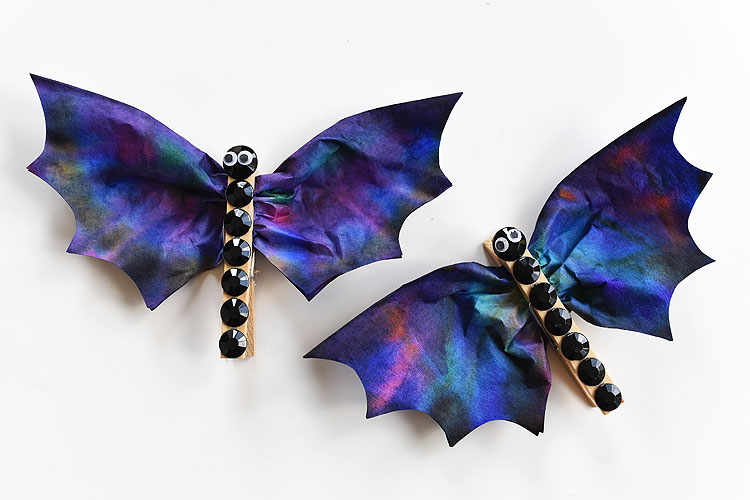 These coffee filter bats are such an easy Halloween craft to make with the kids! They're fun, spooky, simple to make and surprisingly beautiful! They'd make great Halloween decorations! I love the black rhinestones!