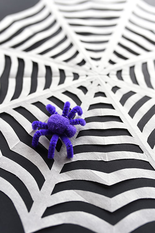 Closeup of a paper spiderweb