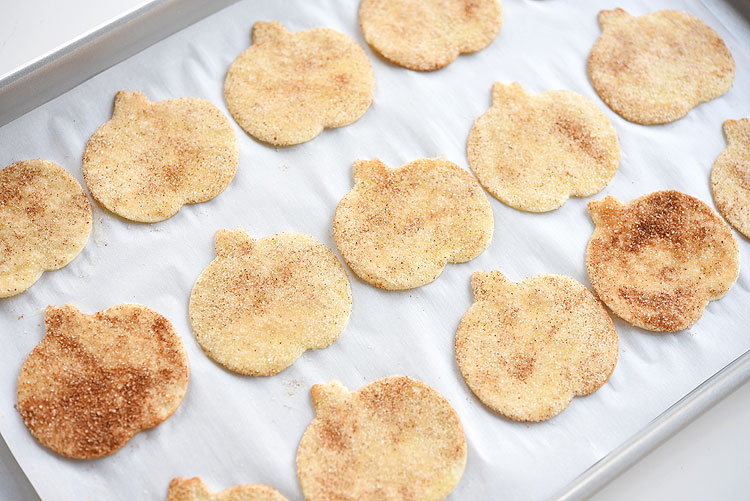 These easy pumpkin shaped cinnamon sugar chips made from flour tortillas taste SO GOOD! They have a perfect, buttery crunch with a delicious cinnamon sugar coating! Such a great fall snack idea that's so addictive!