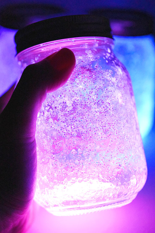 These fairy jars are so easy to make and they look SO COOL! All you need is a glow stick, glitter and a mason jar and you can capture your own twinkling fairies in a jar! This is such a great glow stick idea and a super easy kids activity!