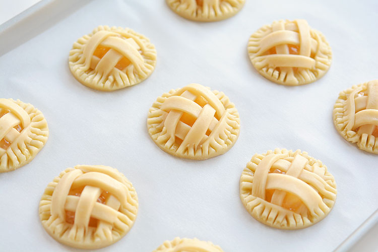 These mini apple pies are SO GOOD! There's nothing like warm apple pie, with a delicious flaky crust and that gooey, sweet apple filling. These delicious fall treats will disappear fast!