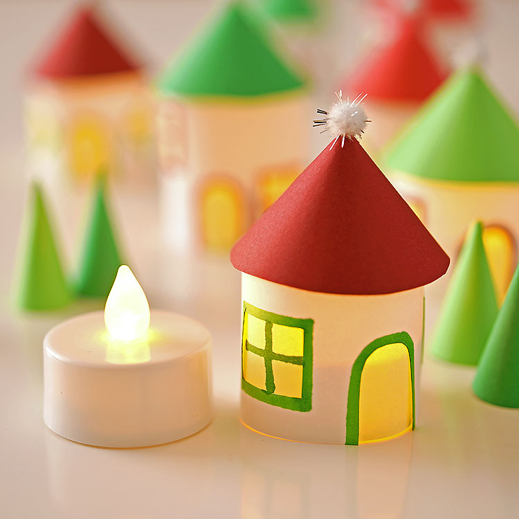 40+ Easy Christmas Crafts for Kids - Twinkling Paper Roll Christmas Village