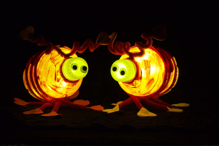 Create love bugs for Valentine's Day using water bottles and glow sticks. They are SO fun to play with in a dark room!