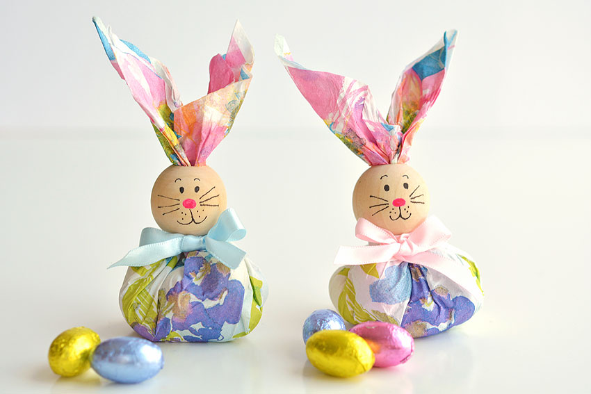 These paper napkin bunny favors are SO CUTE! And they're really easy to make! With dollar store paper napkins and foil covered eggs you can make adorable Easter treats to give away to the kids, grandkids or even to the classroom at school! They'd even make super cute decorations for the Easter table. This is such a fun and simple Easter craft idea.