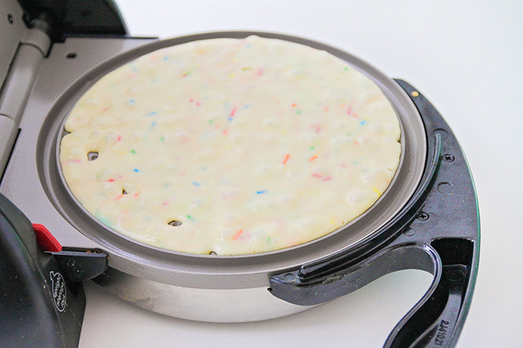 These cake batter waffles taste just like birthday cake, but in waffle form! They're perfect for birthdays, or just any time you need a special breakfast!